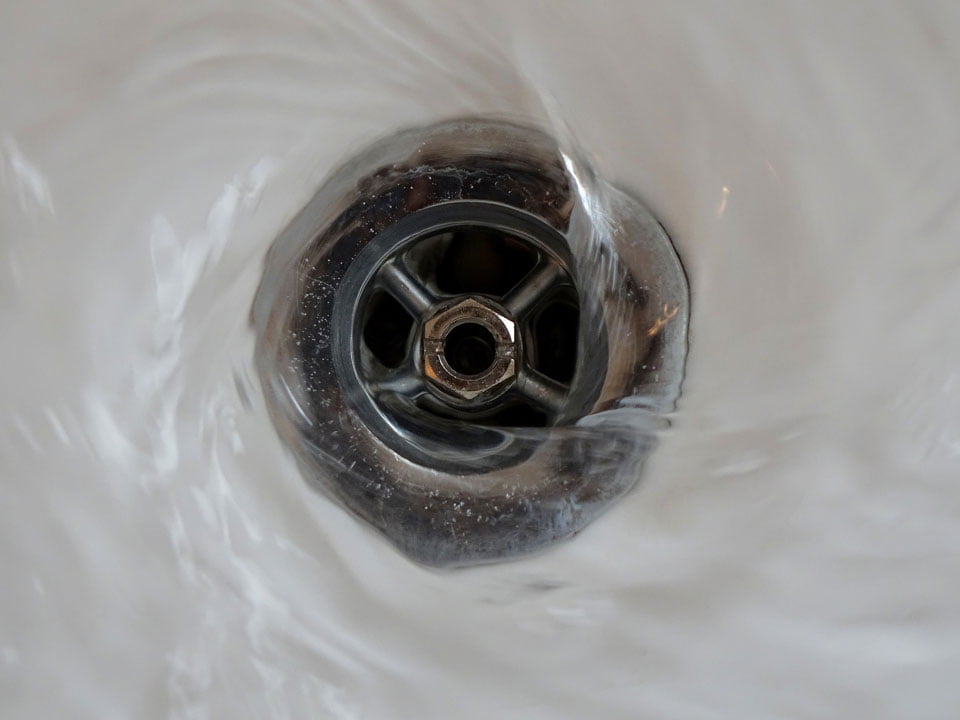 Clean plug hole | West Sussex Drains