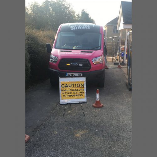 West Sussex Drains Van With Caution Sign