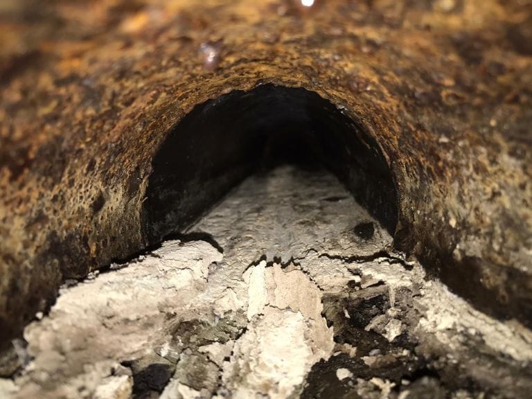 Close up inside blocked drain